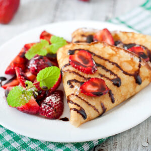 pancakes-with-strawberries-and-chocolate-decorated-with-mint-leaf (1)